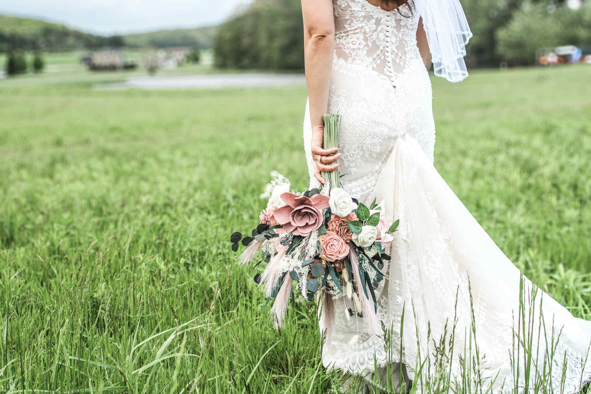 Bride holding wedding bouquet during outdoor wedding portrait in Cumberland Maryland