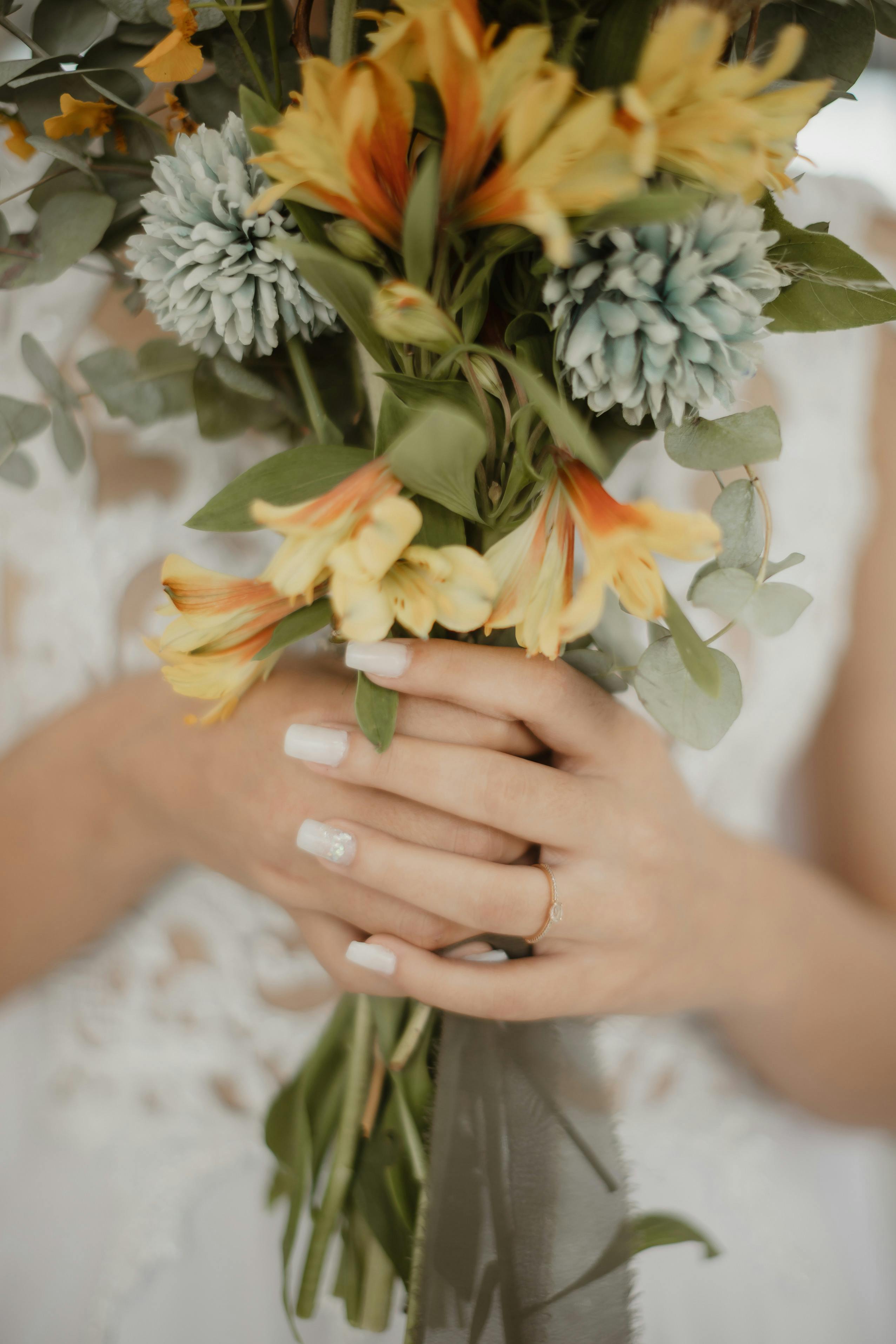 Elegant bridal nails close up wedding detail shot