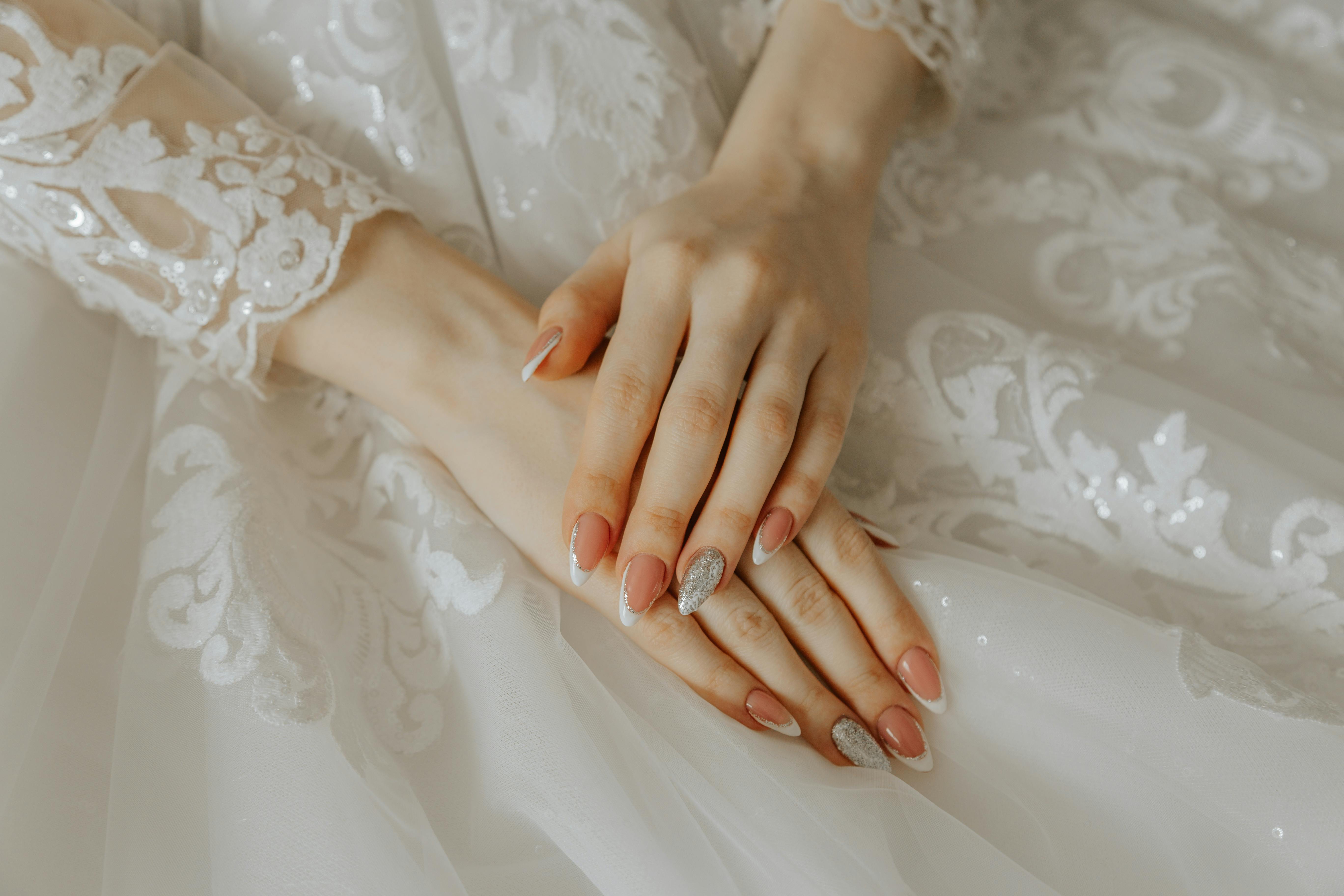 Soft feminine bridal nails close up romantic detail