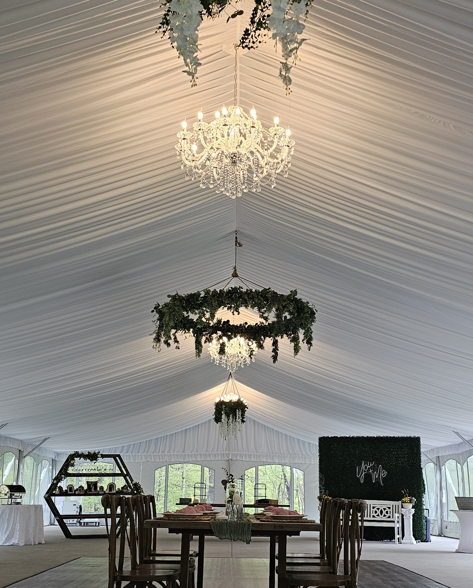 The StoneBridge Manor reception tent chandeliers