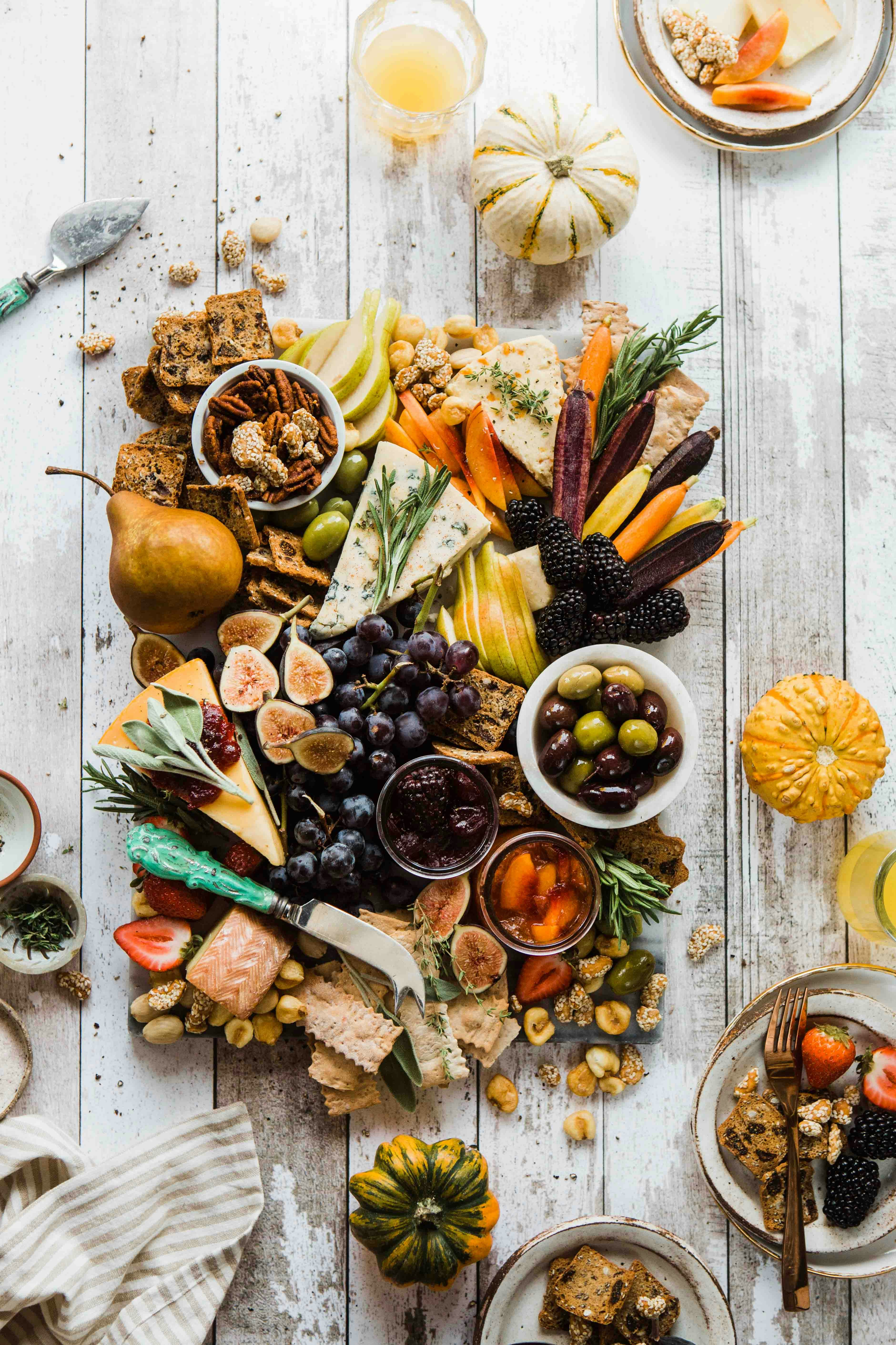 Elegant grazing table with fresh fruit and charcuterie