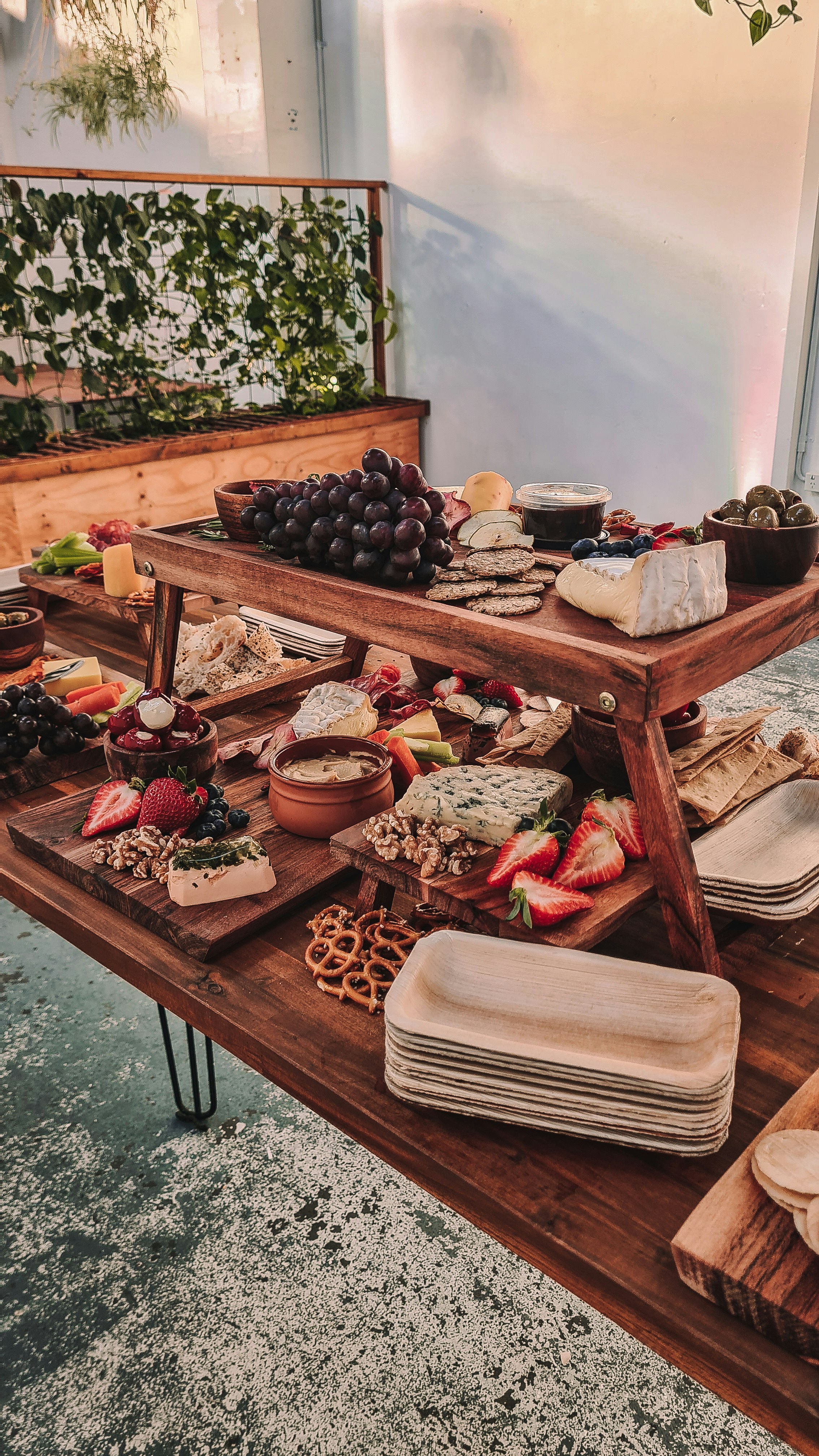 Charcuterie grazing table idea for wedding cocktail hour